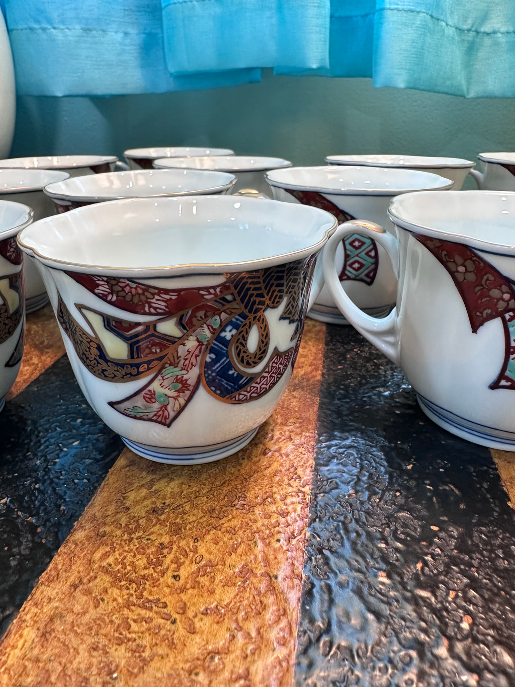Gold Imari set 12 cups and 1 large bowl. $65 in store pick up