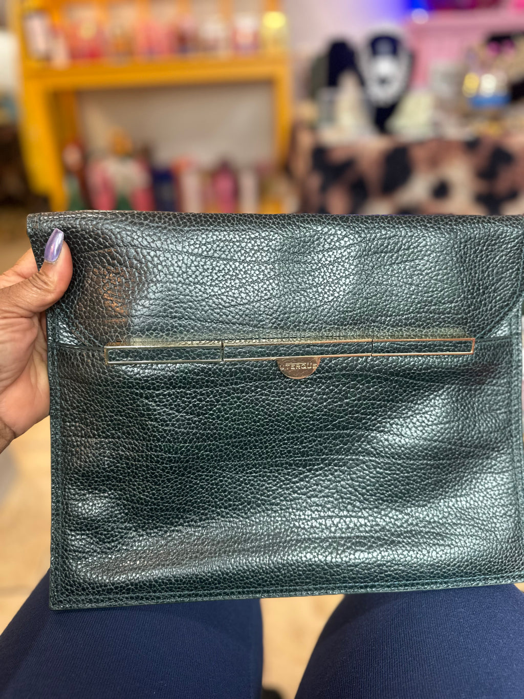 UTERQUE Hunter Green bag ($40)