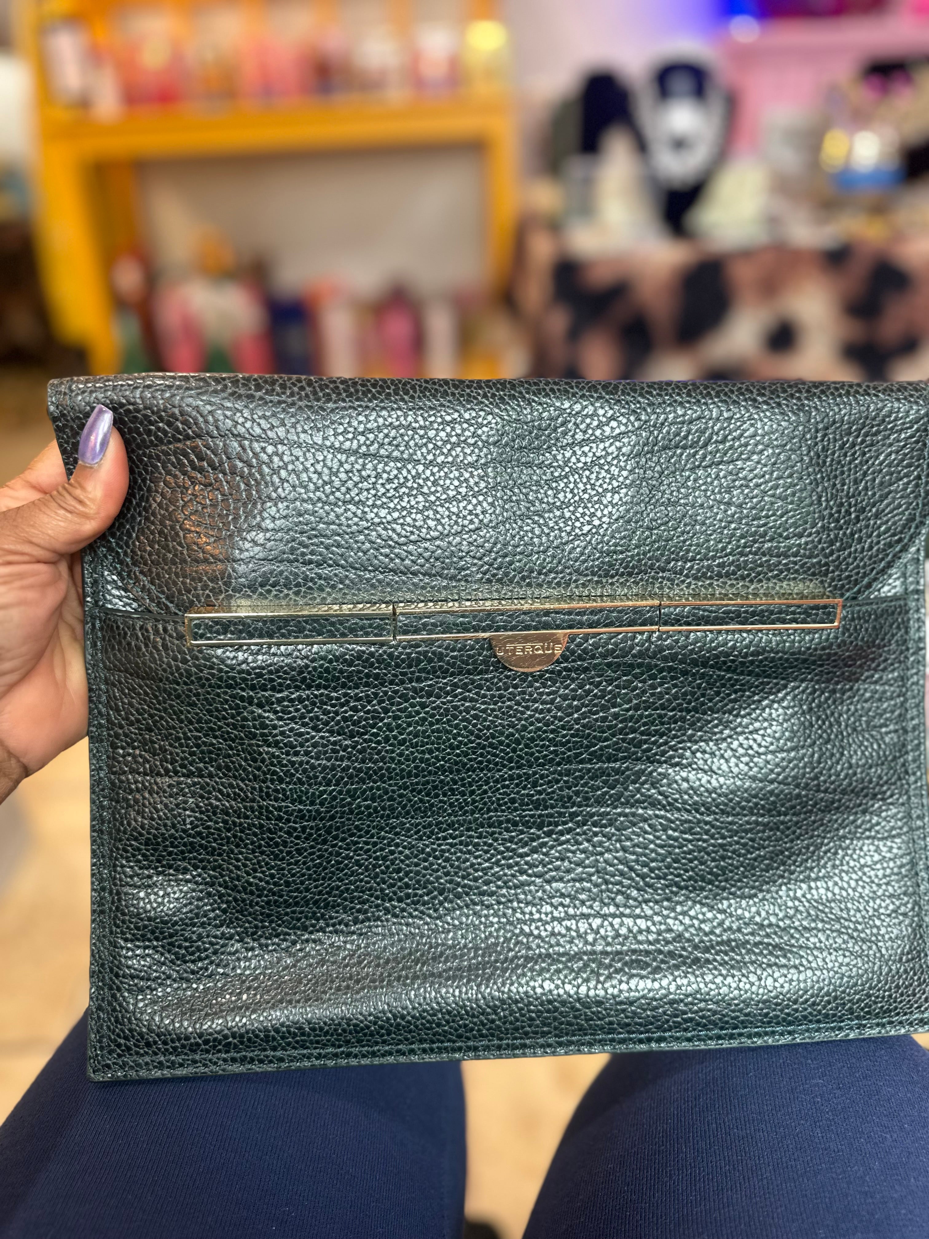 UTERQUE Hunter Green bag ($40)