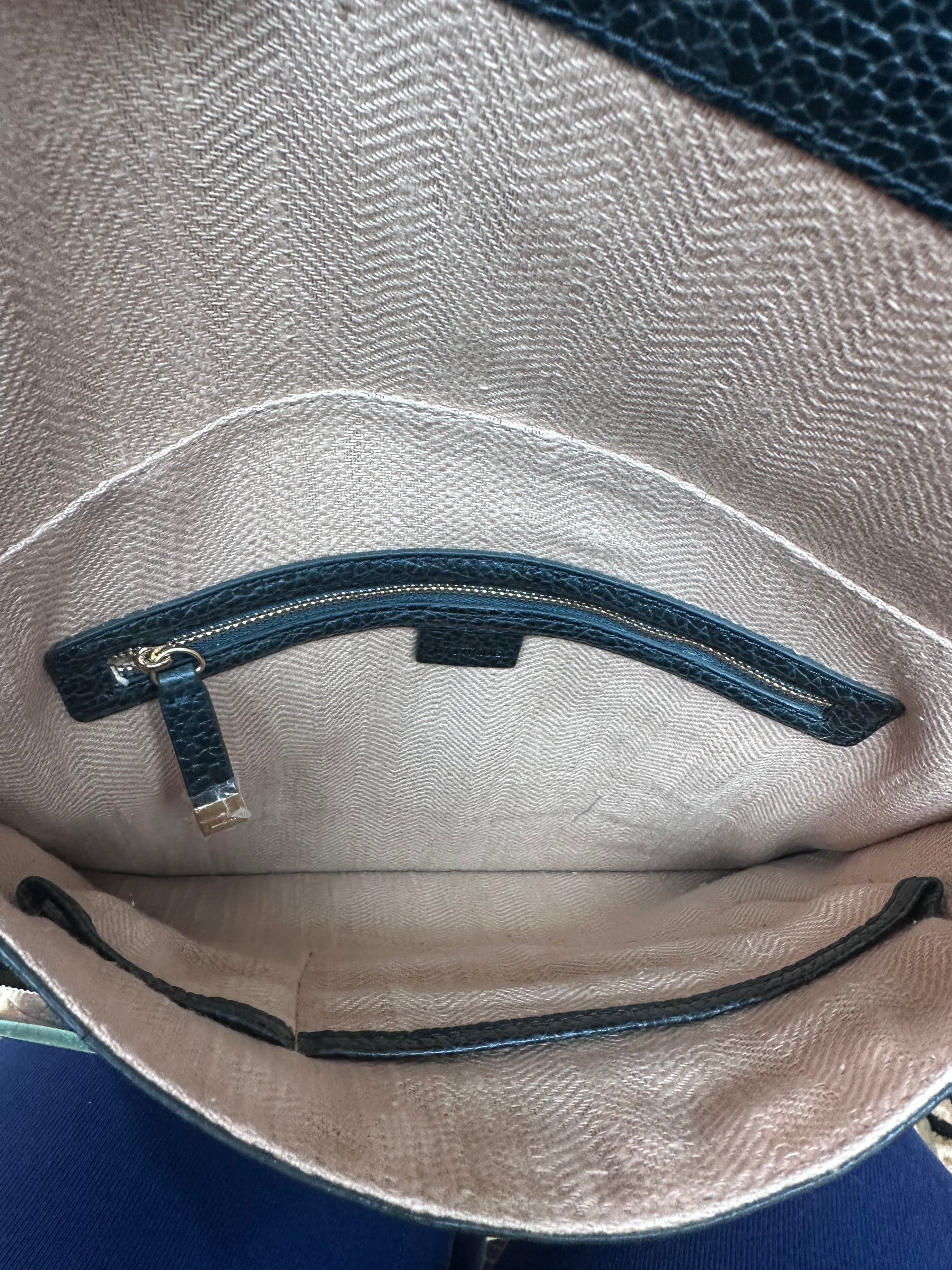 UTERQUE Hunter Green bag ($40)