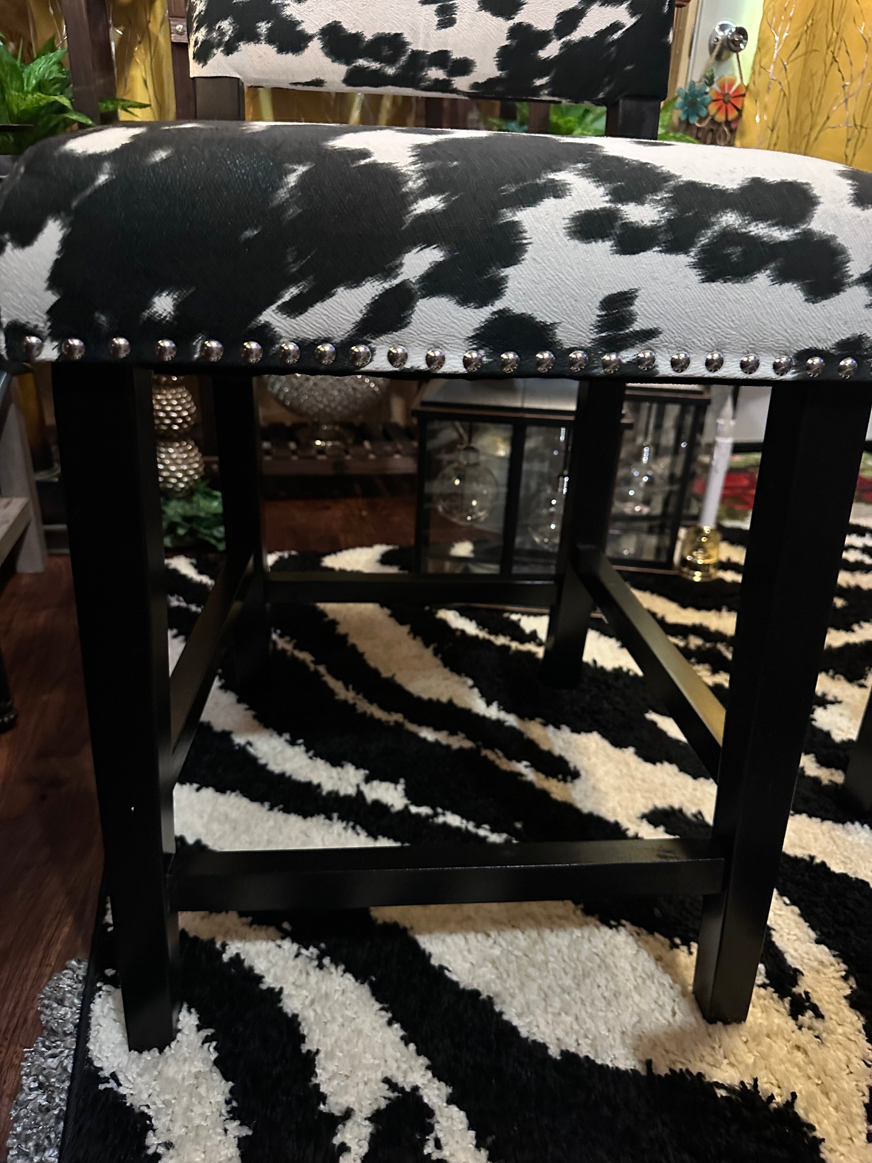 Cow chairs (2) excellent condition sold as a set- in store pick up only