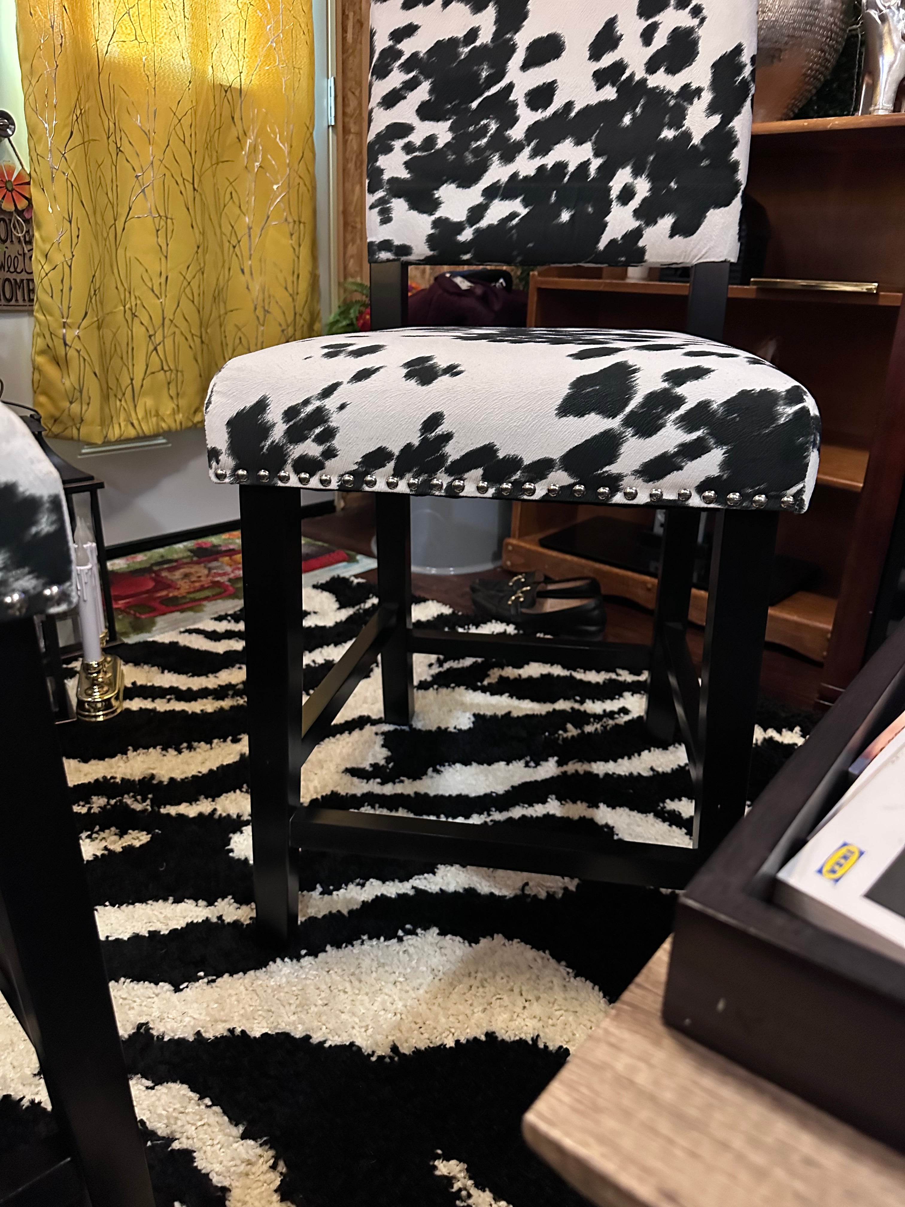 Cow chairs (2) excellent condition sold as a set- in store pick up only
