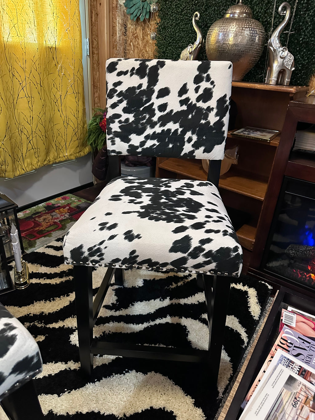 Cow chairs (2) excellent condition sold as a set- in store pick up only