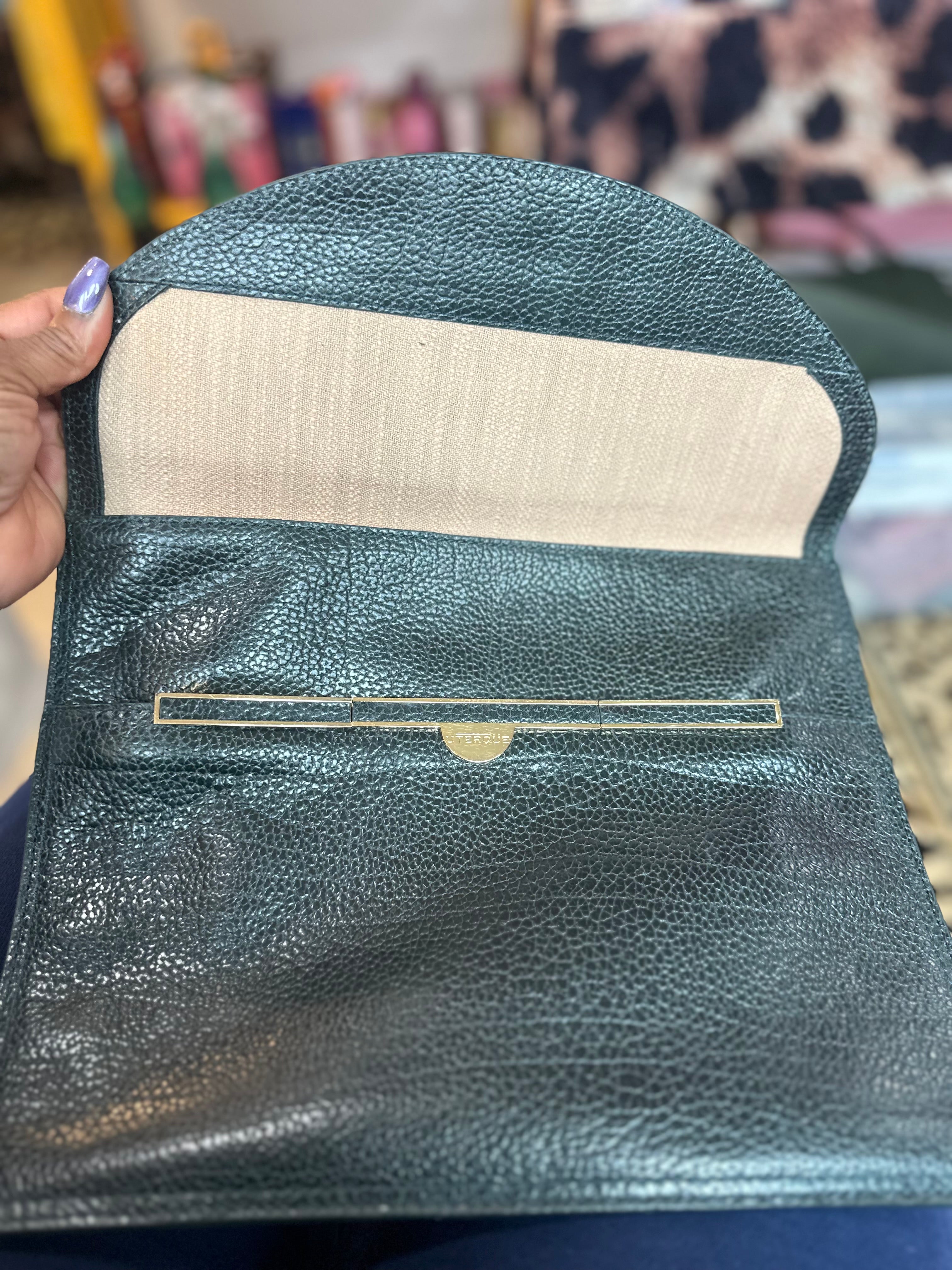 UTERQUE Hunter Green bag ($40)
