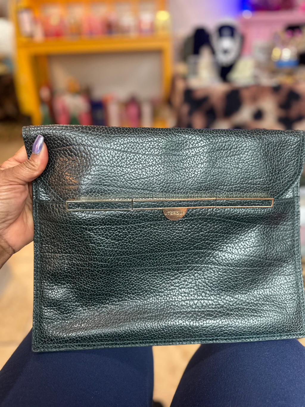 UTERQUE Hunter Green bag ($40)