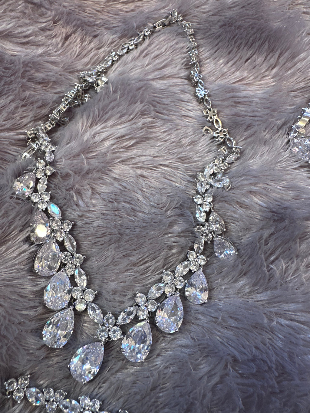 5 piece set (New) pierced earrings, 2 necklaces, bracelet and tiara crown