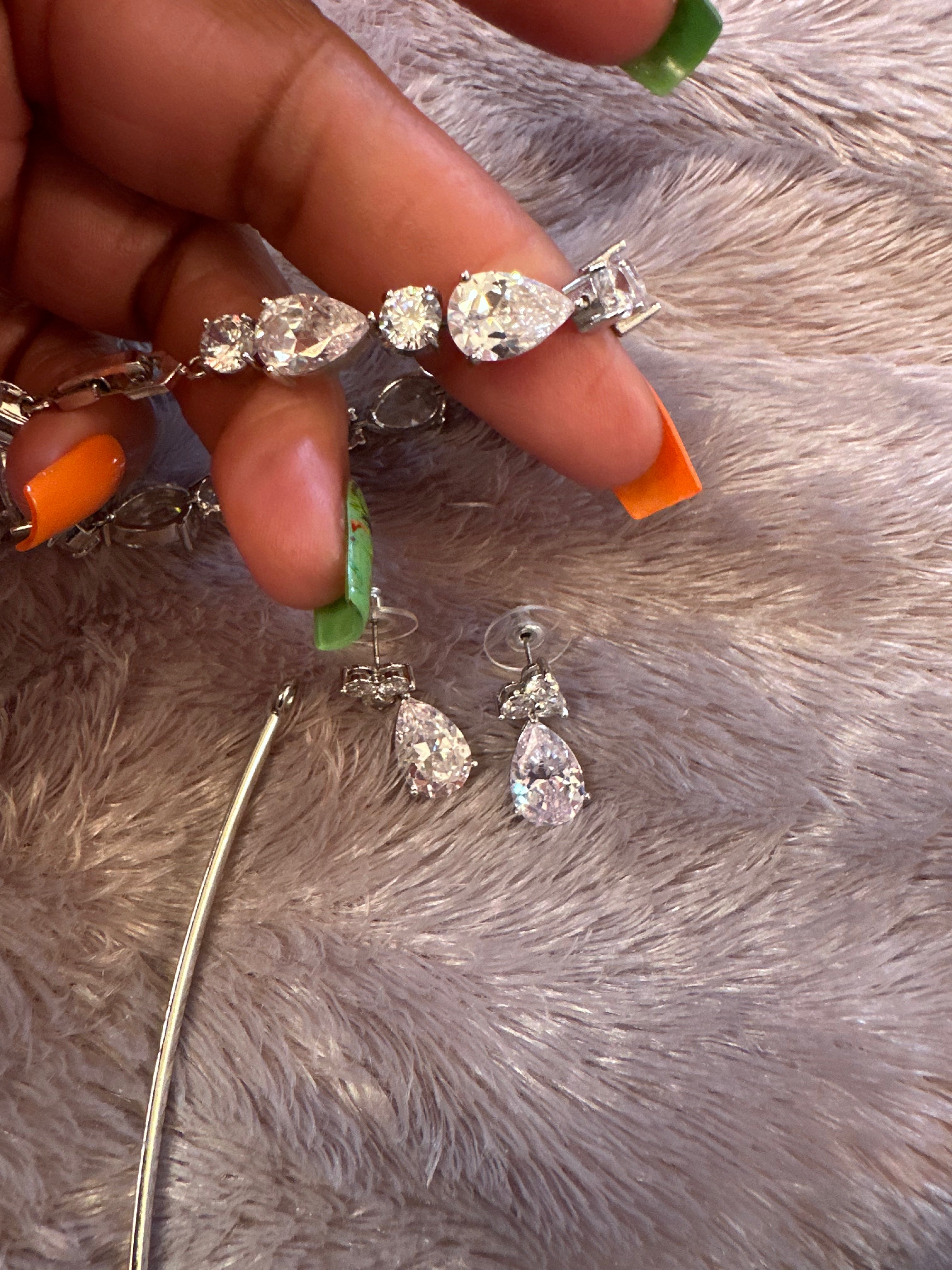 5 piece set (New) pierced earrings, 2 necklaces, bracelet and tiara crown