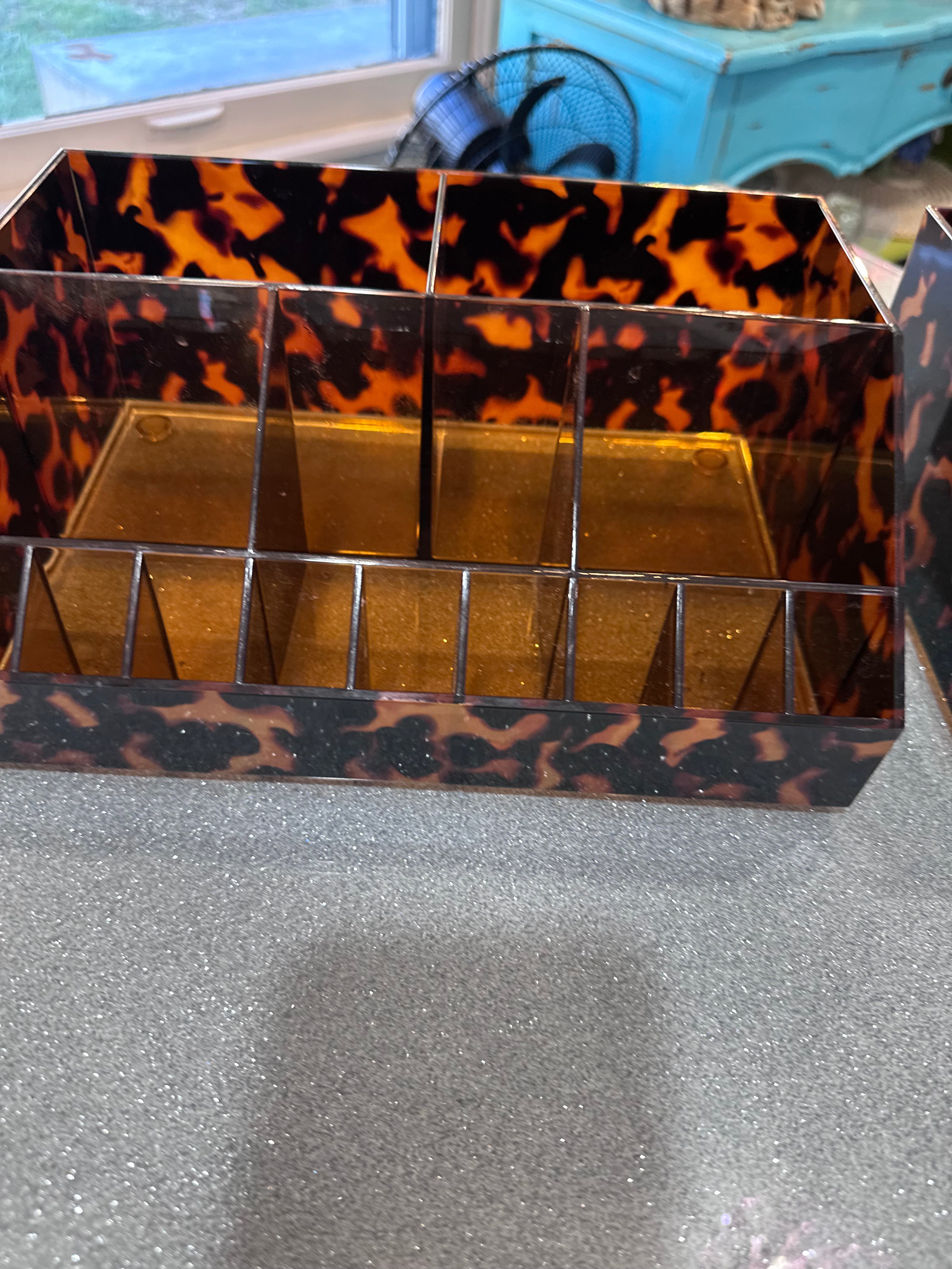 Make up organization for brushes, lipstick etc ( you get 2 of them- leopard print