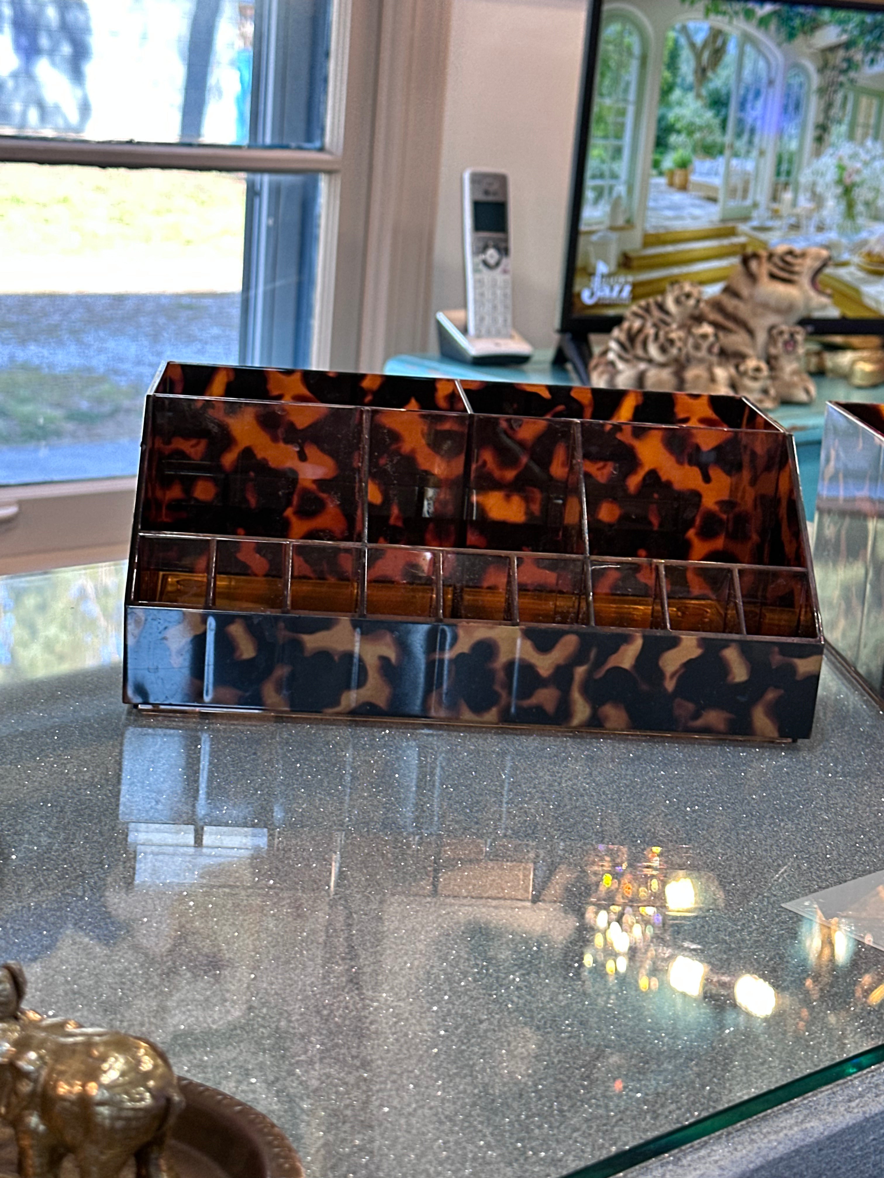 Make up organization for brushes, lipstick etc ( you get 2 of them- leopard print