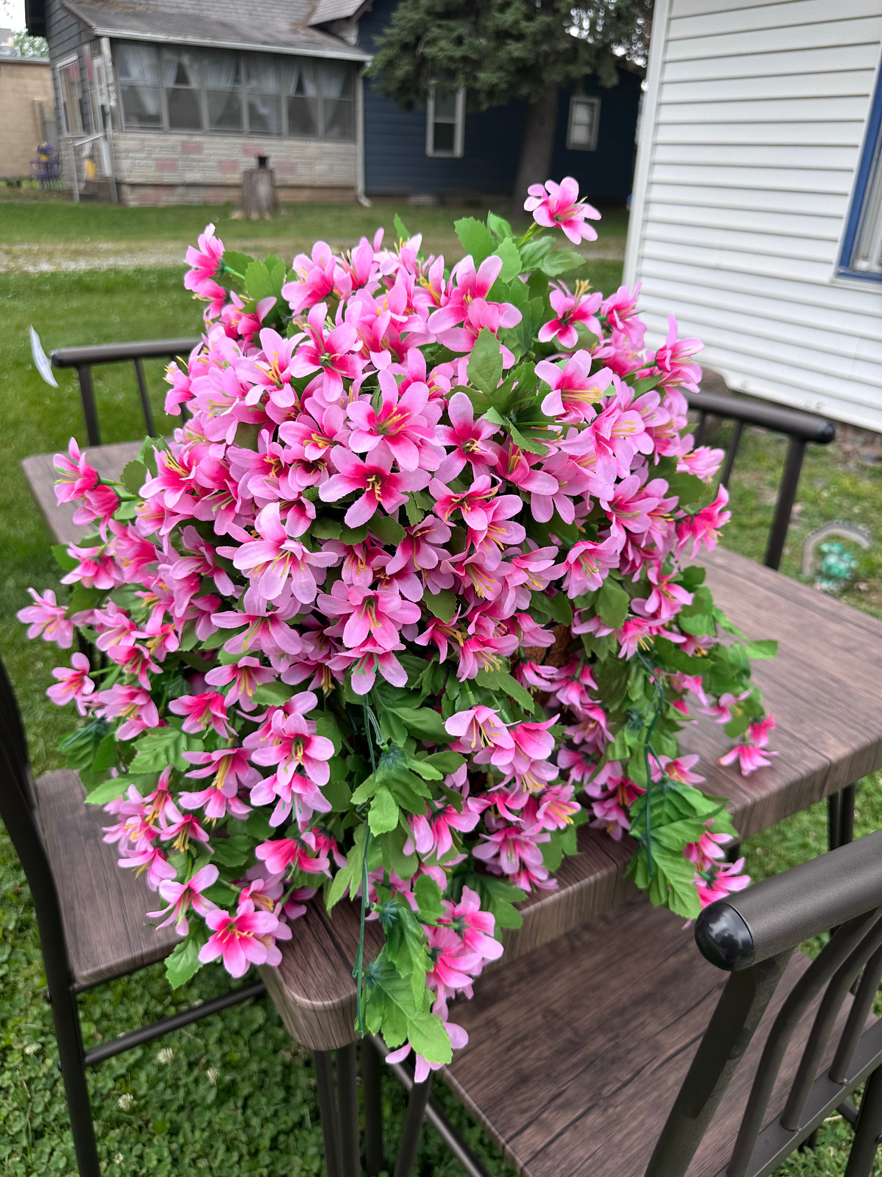 2 Pink Flowers hanging baskets $15 each